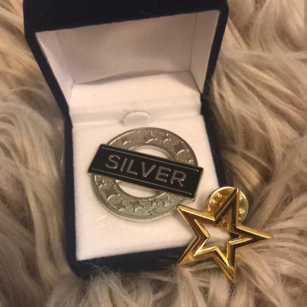Gold FabFitFun star and silver star buttons